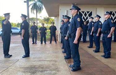 Police Officers, standing at attention