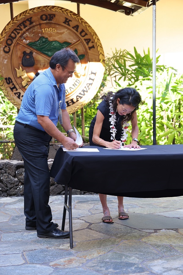 Emily Ishida signs oath of office