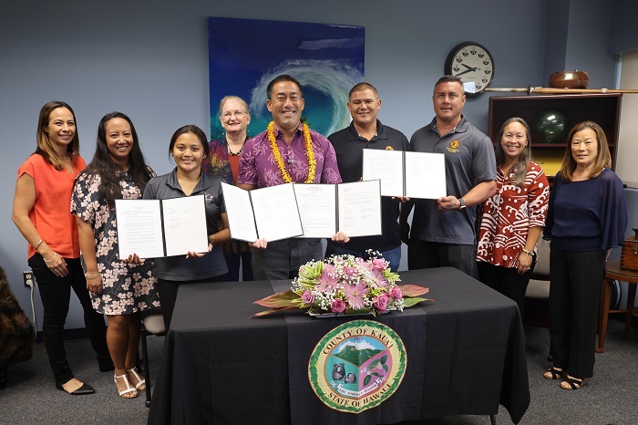 Group photo of signing ceremony
