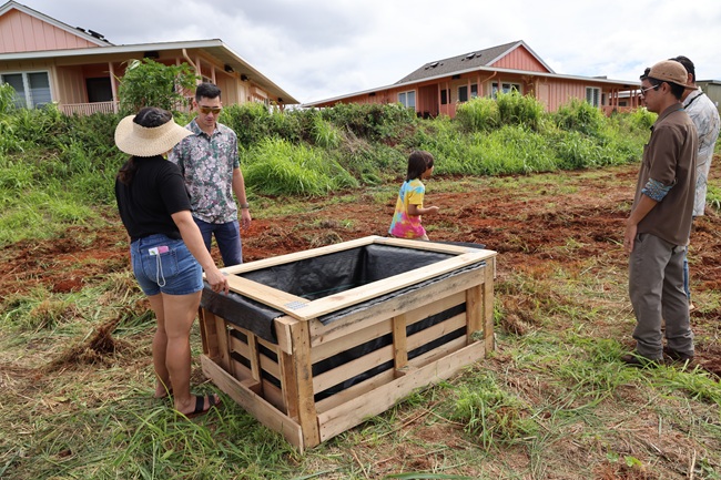 The Leadership Kaua'i team showcases a raised gardening bed example made out of recycled pallets..JPG