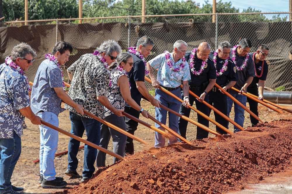 Community leaders and project partners join together to break ground.