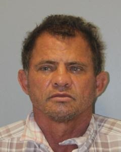 Henry Aul III, 61, is 5 feet 8 inches tall and weighs approximately 177 pounds.