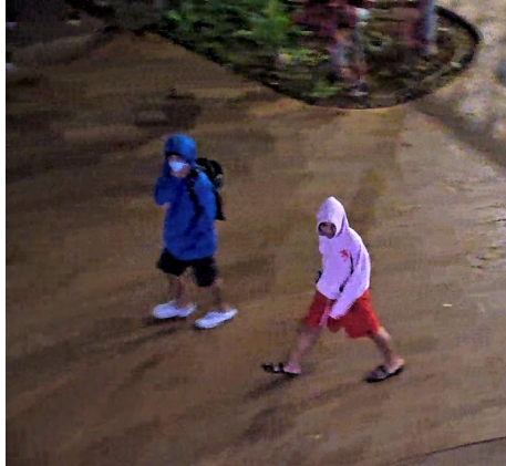 Surveillance still captured on July 25, 2025. If you recognize the individuals in this image, please contact the Kaua‘i Police Department at (808) 241-1711.