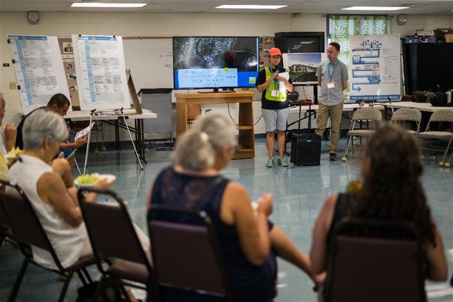 County staff at a public meeting