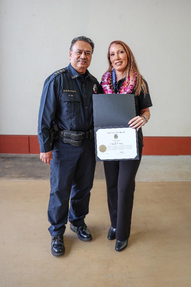 Chief Rudy Tai and Emergency Services Dispatcher Stephanie Neher.
