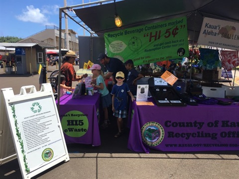County Farm Fair recycling booth with student volunteer